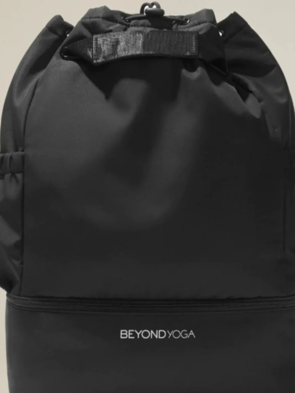 Beyond Yoga Black Drawstring Women’s Backpack with Lower Zip Pocket